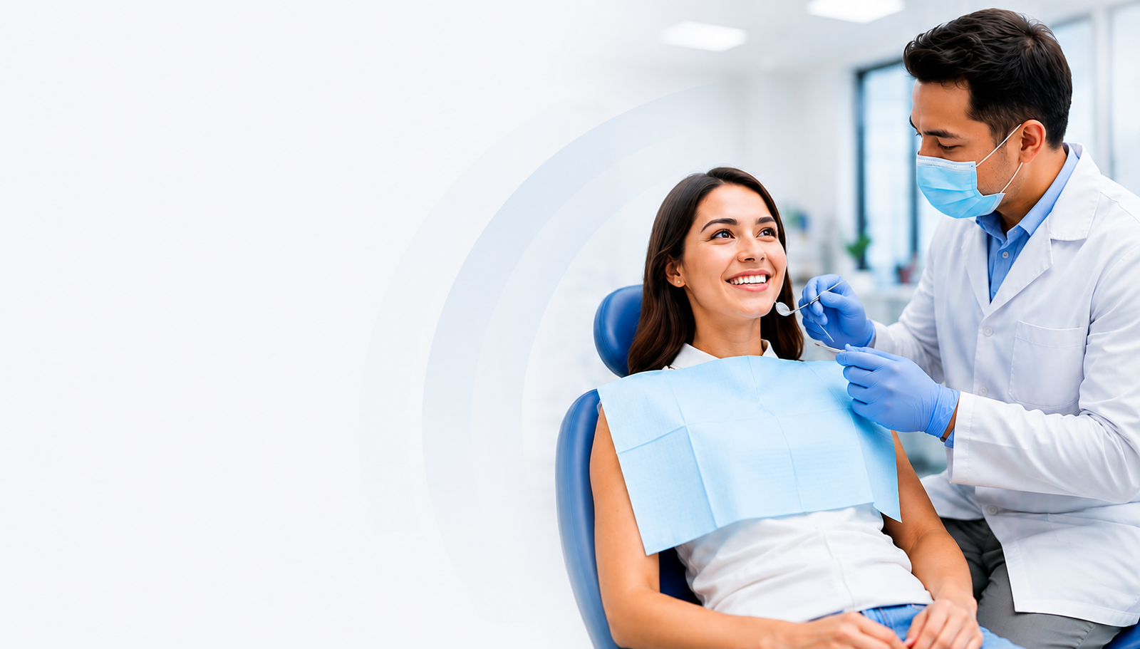Dentist treating a smiling patient